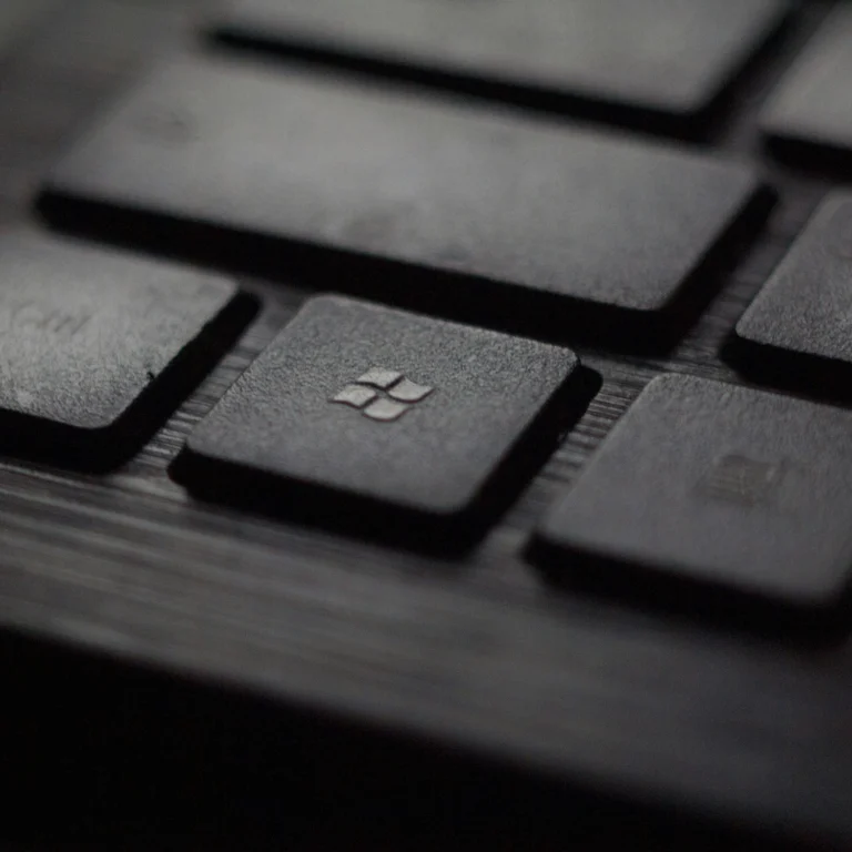 Windows keyboard with Windows key in focus.