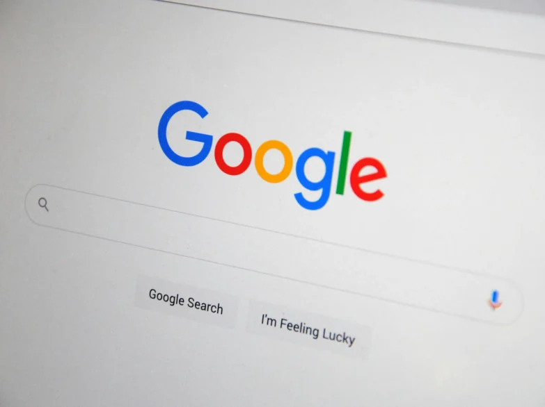 Close up of a laptop screen displaying a Google search engine browser.