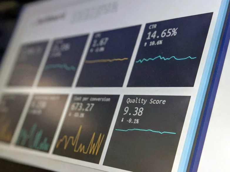 A computer screen showing colourful graphs and data visualisations for analysis and reporting.